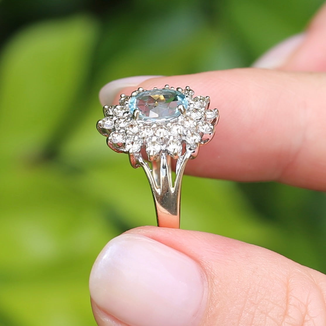 1.1ct Oval Aquamarine and Double Diamond Halo (0.88ct), 9ct White and Yellow Gold, size 6.25 or M