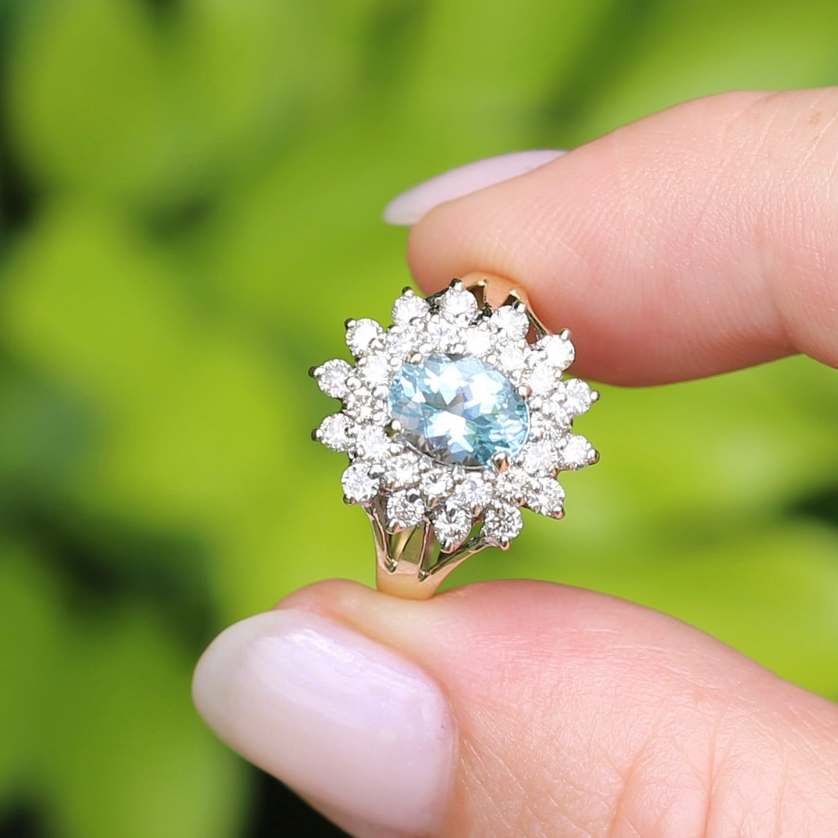 1.1ct Oval Aquamarine and Double Diamond Halo (0.88ct), 9ct White and Yellow Gold, size 6.25 or M