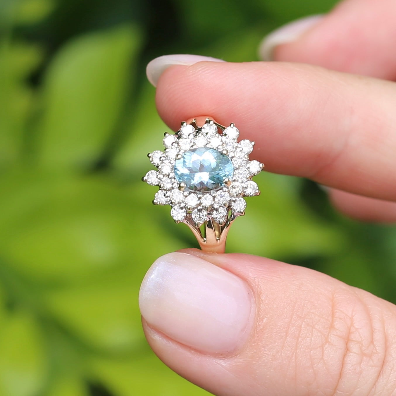 1.1ct Oval Aquamarine and Double Diamond Halo (0.88ct), 9ct White and Yellow Gold, size 6.25 or M