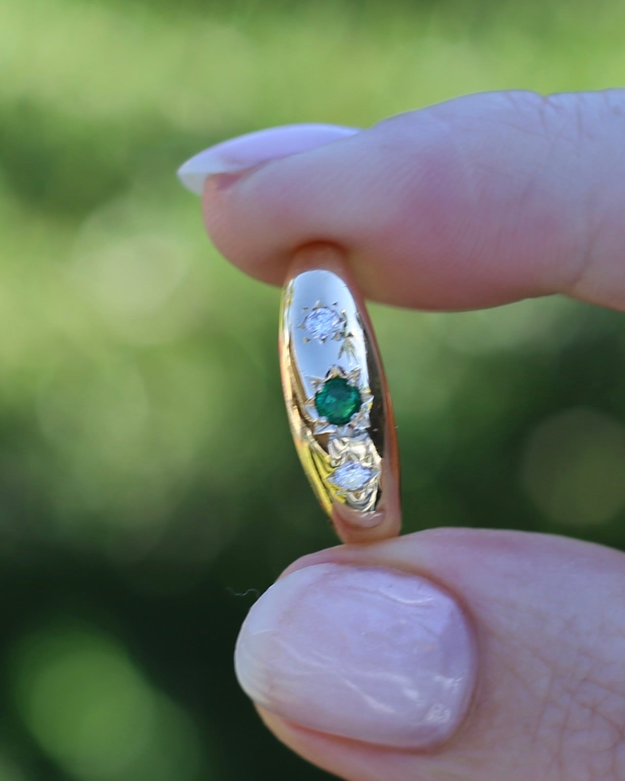 1975 Made Natural Emerald and Diamond Star Set Trilogy, 18ct Yellow Gold, size 7.75 or just under P1/4