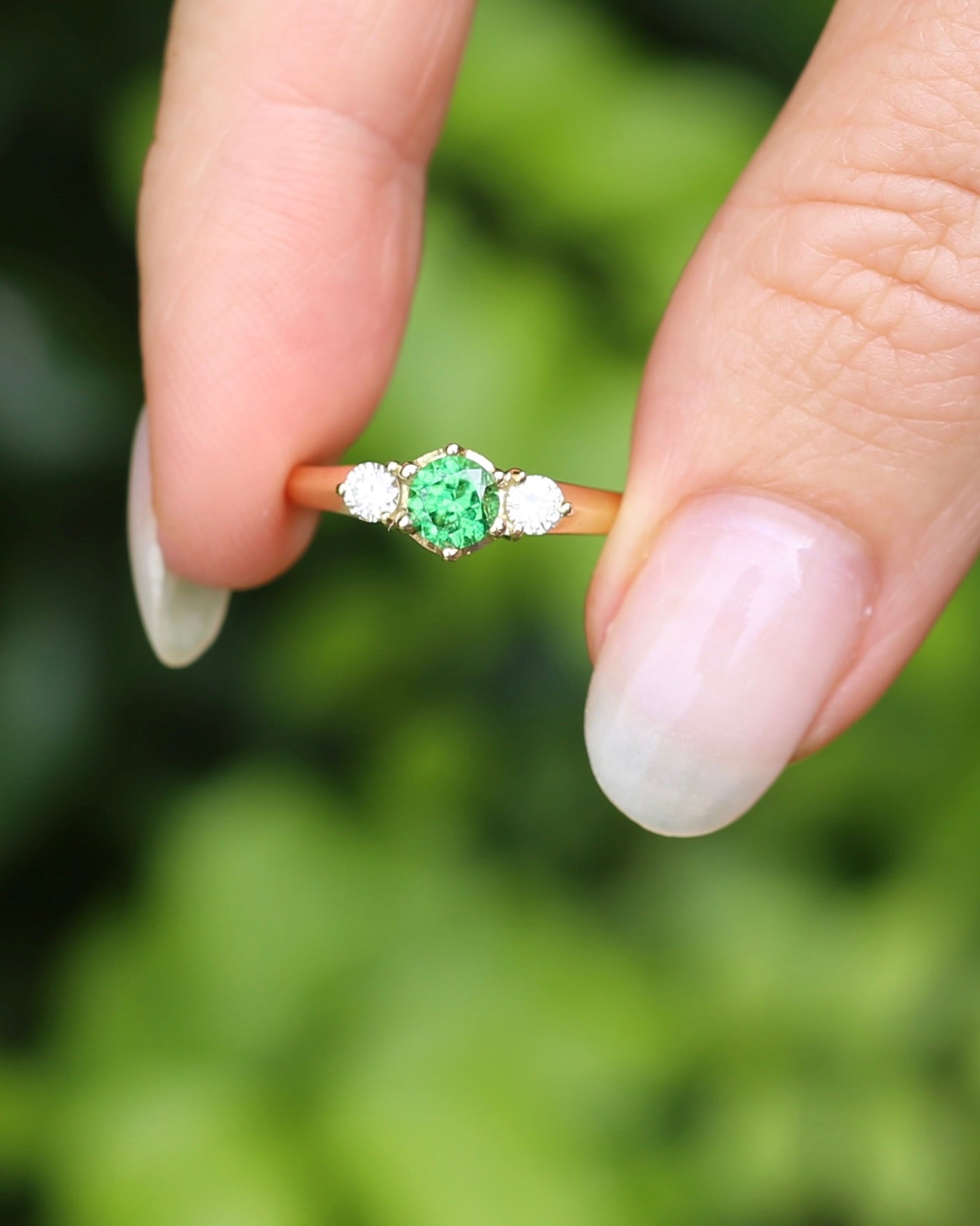 East African Tsavorite Garnet and Diamond Trilogy Ring, 18ct Yellow Gold, size K or 5.5 with valuation