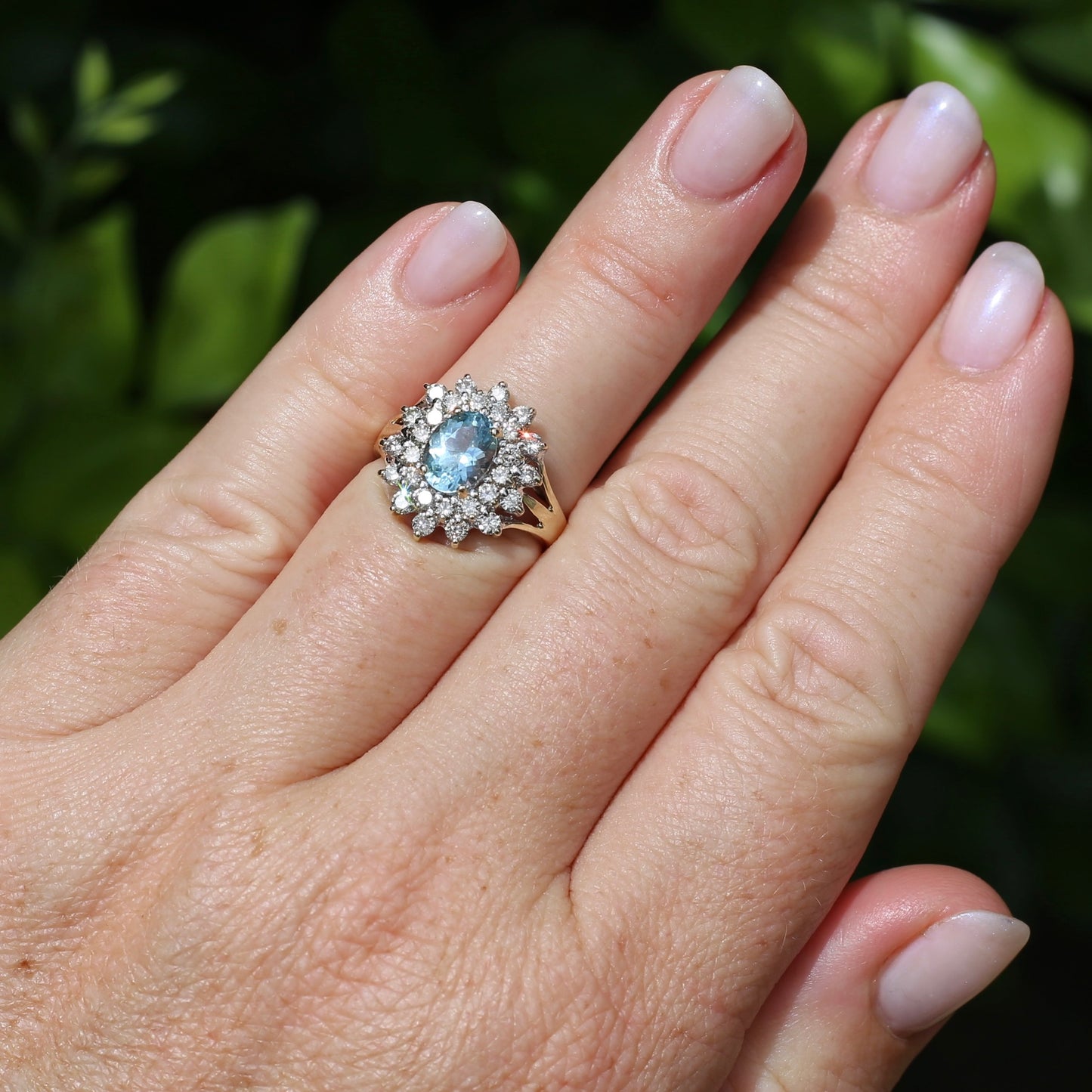 1.1ct Oval Aquamarine and Double Diamond Halo (0.88ct), 9ct White and Yellow Gold, size 6.25 or M