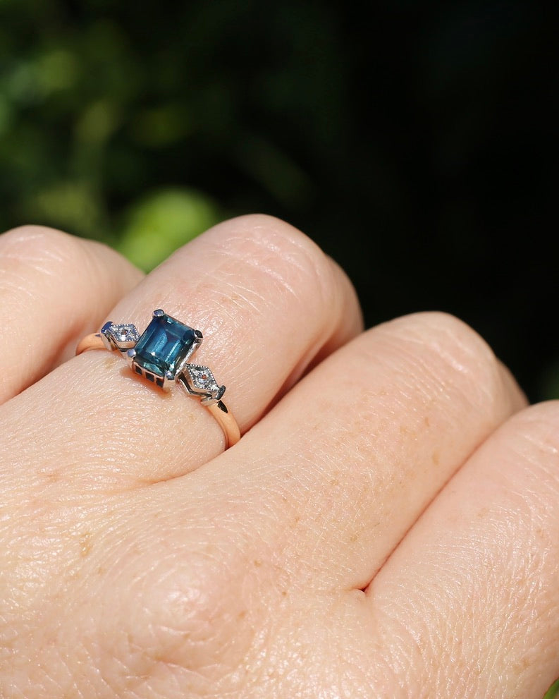 1.09ct Emerald Cut Teal Australian Sapphire With Diamonds in Vintage Trilogy Setting, 9ct Yellow and White Gold, size N1/2 or 6.75, 2.05g