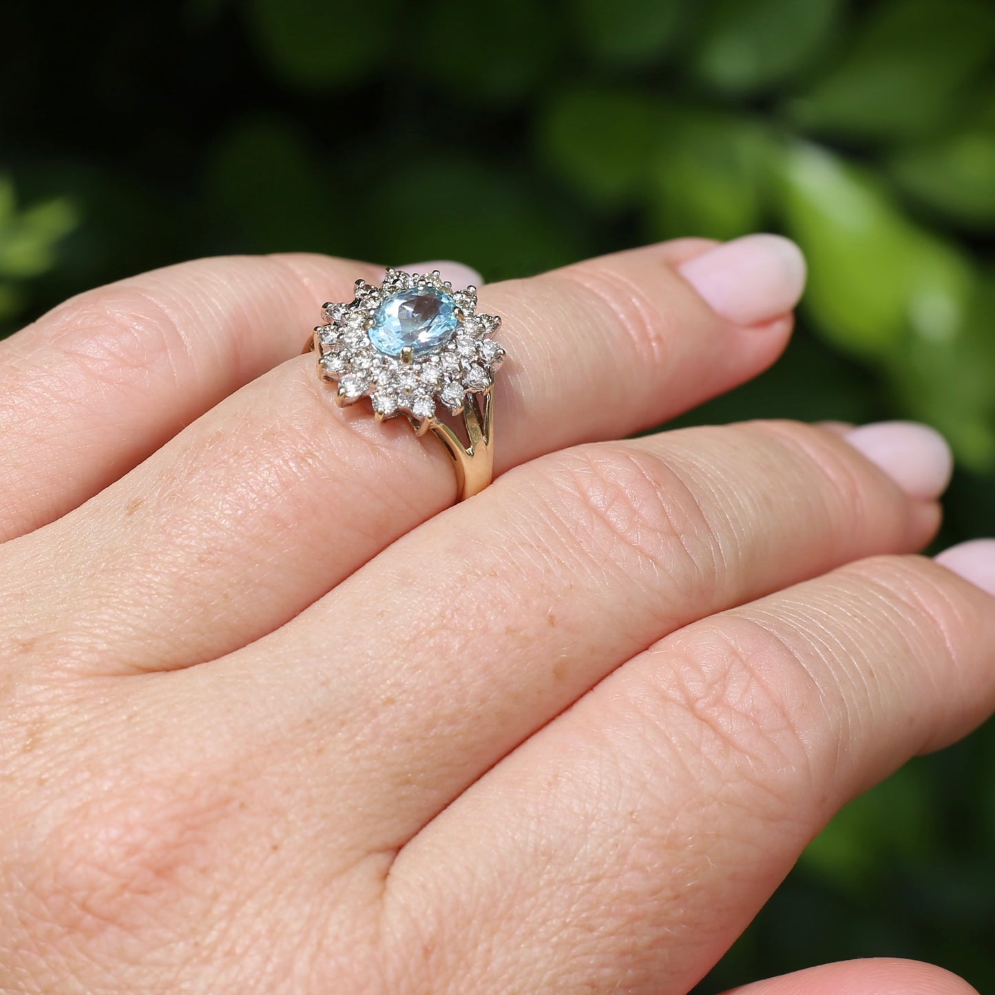 1.1ct Oval Aquamarine and Double Diamond Halo (0.88ct), 9ct White and Yellow Gold, size 6.25 or M