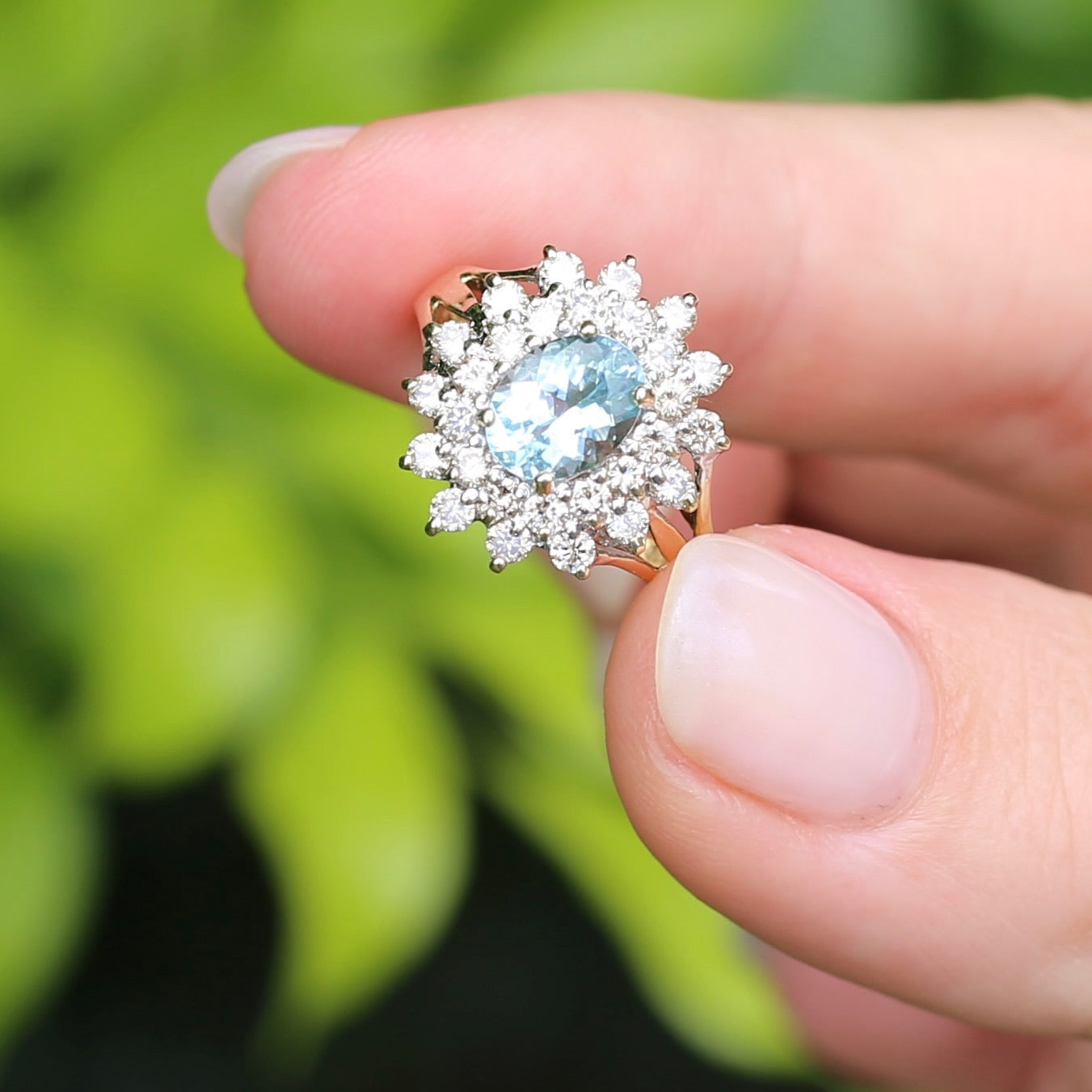 1.1ct Oval Aquamarine and Double Diamond Halo (0.88ct), 9ct White and Yellow Gold, size 6.25 or M