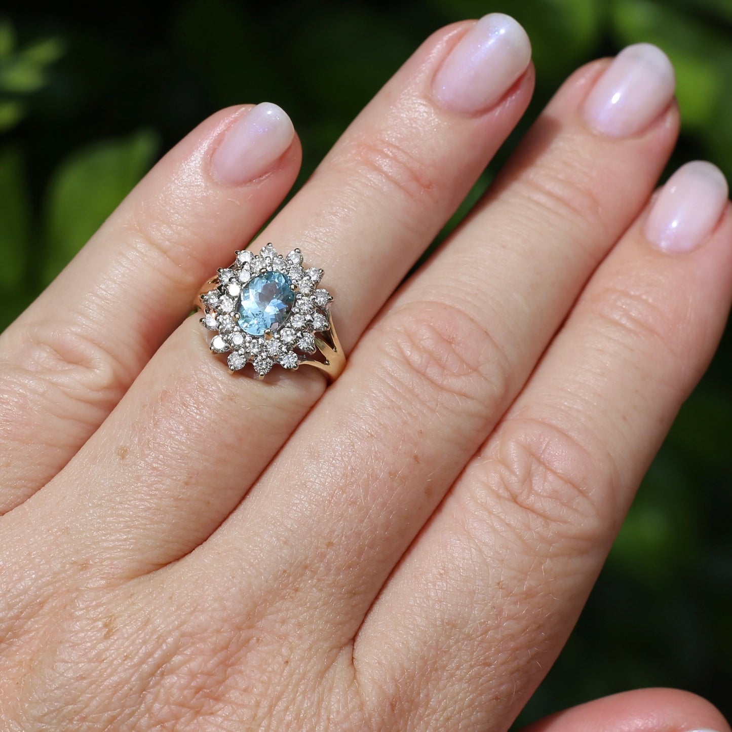 1.1ct Oval Aquamarine and Double Diamond Halo (0.88ct), 9ct White and Yellow Gold, size 6.25 or M