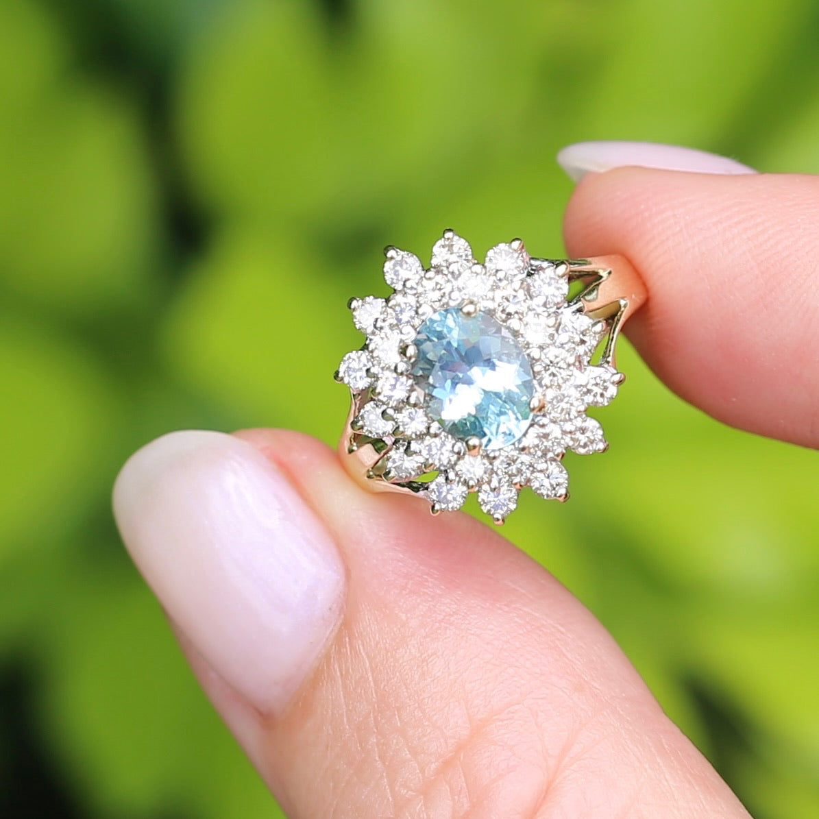 1.1ct Oval Aquamarine and Double Diamond Halo (0.88ct), 9ct White and Yellow Gold, size 6.25 or M