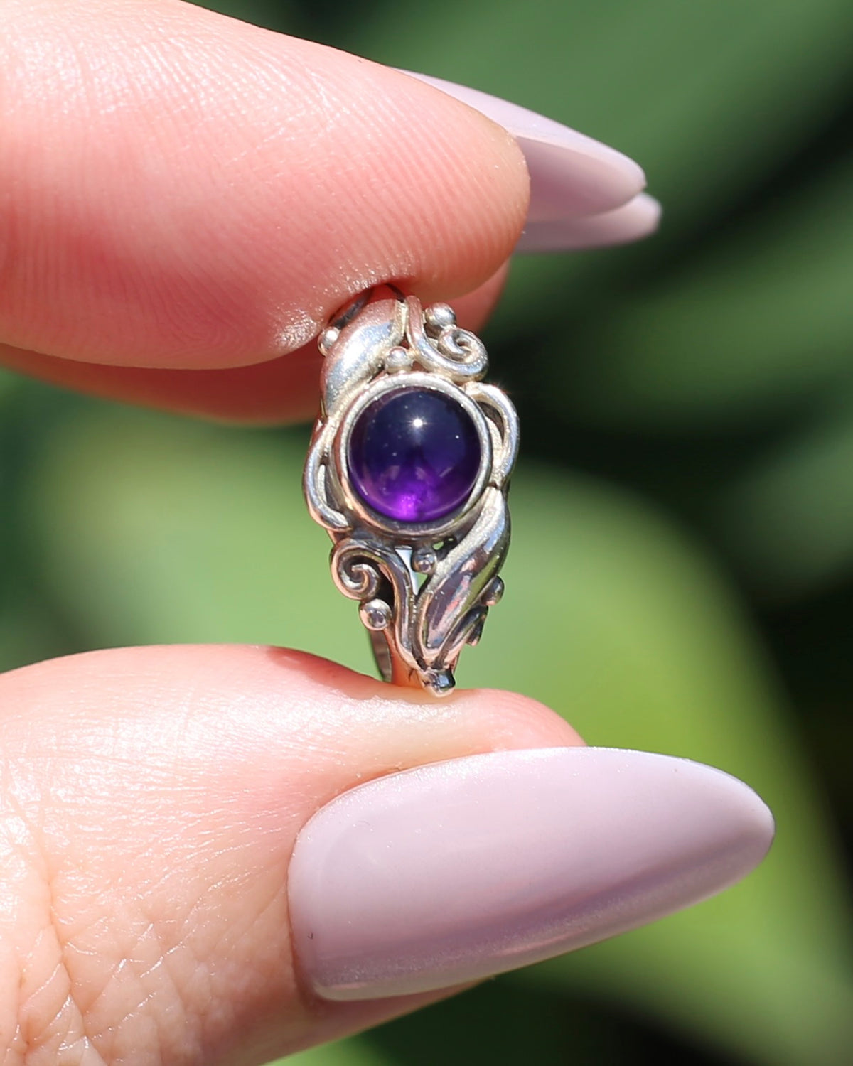 Amethyst Cabochon in Bezel Setting and Leaf & Swirl Surrounds, Sterling Silver, size J1/2 or 5, 3.38g