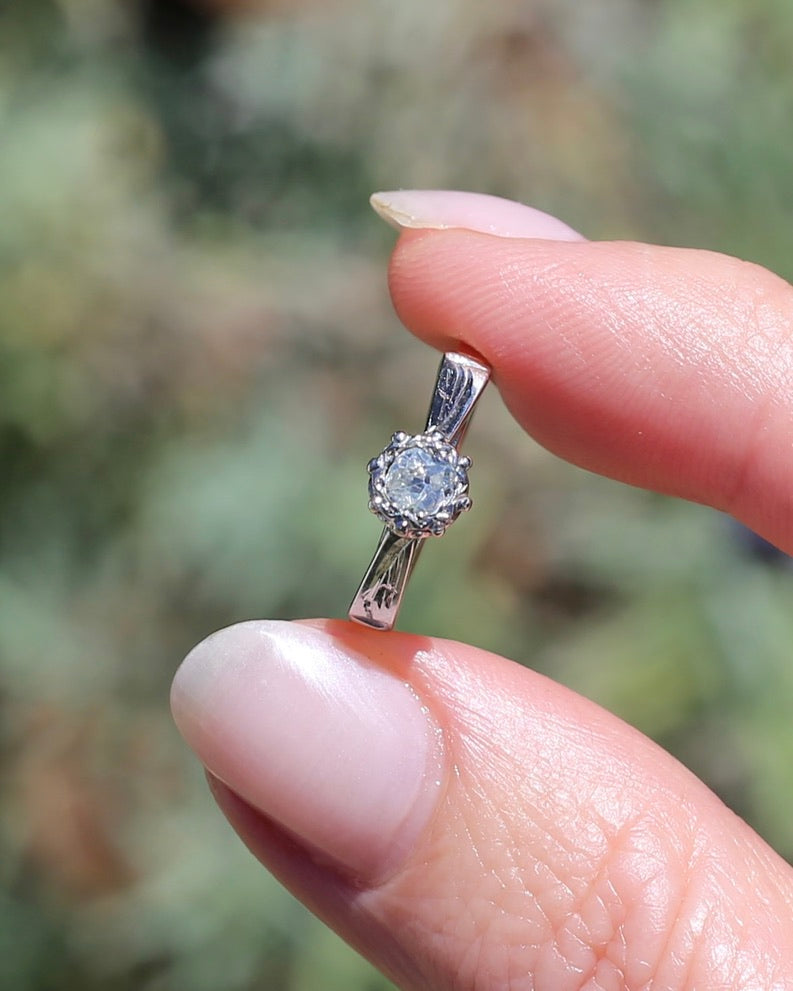 0.22ct old cut diamond solitaire, Platinum and Pale 18ct Gold, size P1/2