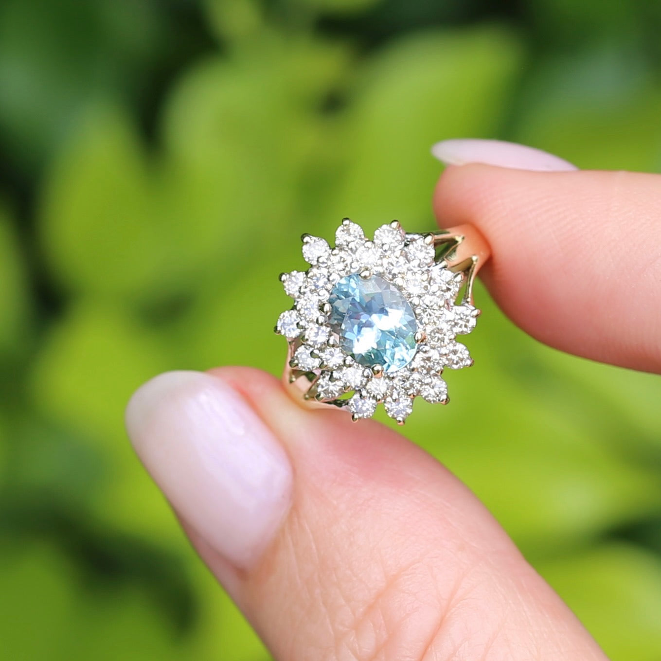 1.1ct Oval Aquamarine and Double Diamond Halo (0.88ct), 9ct White and Yellow Gold, size 6.25 or M