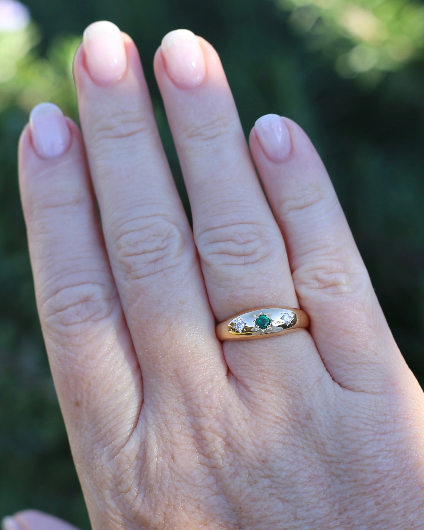 1975 Made Natural Emerald and Diamond Star Set Trilogy, 18ct Yellow Gold, size 7.75 or just under P1/4