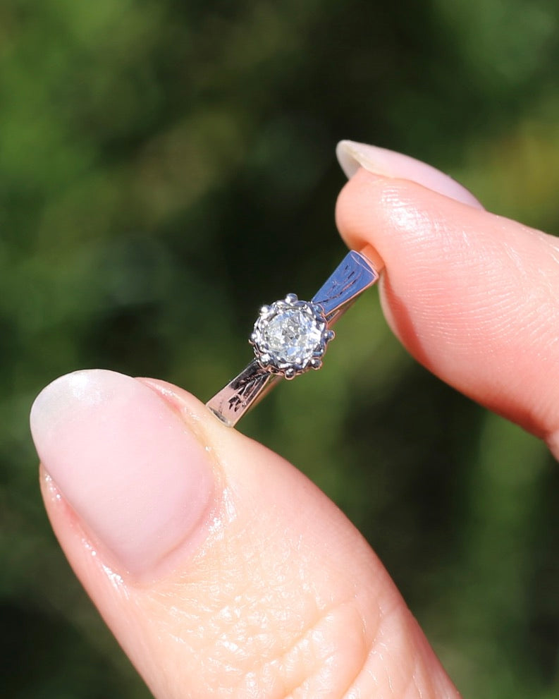 0.22ct old cut diamond solitaire, Platinum and Pale 18ct Gold, size P1/2