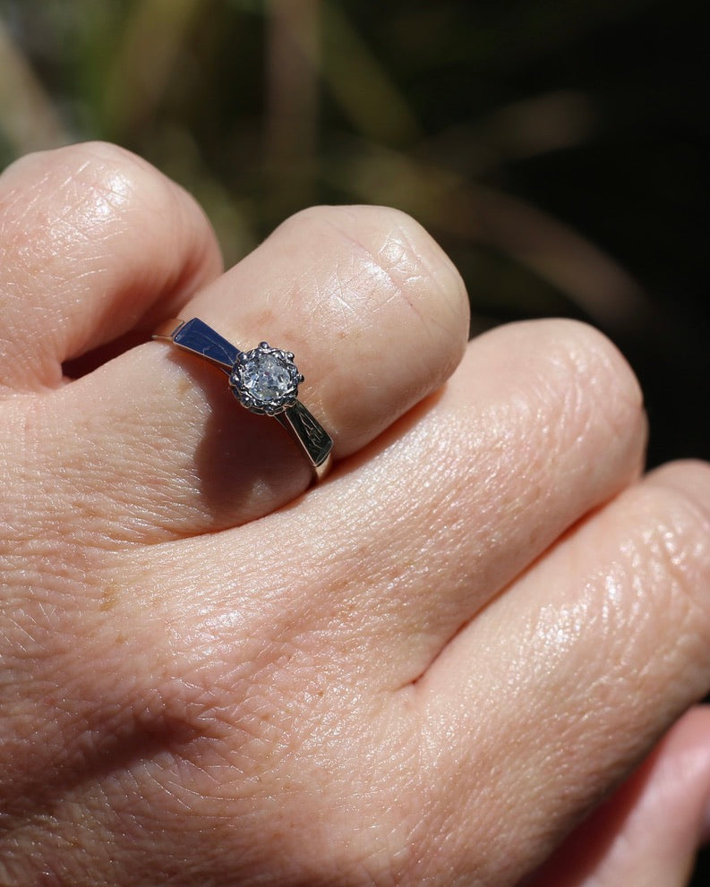 0.22ct old cut diamond solitaire, Platinum and Pale 18ct Gold, size P1/2
