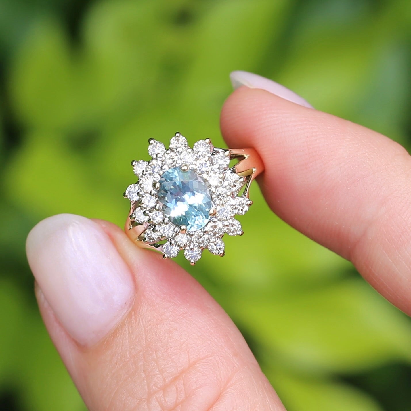 1.1ct Oval Aquamarine and Double Diamond Halo (0.88ct), 9ct White and Yellow Gold, size 6.25 or M