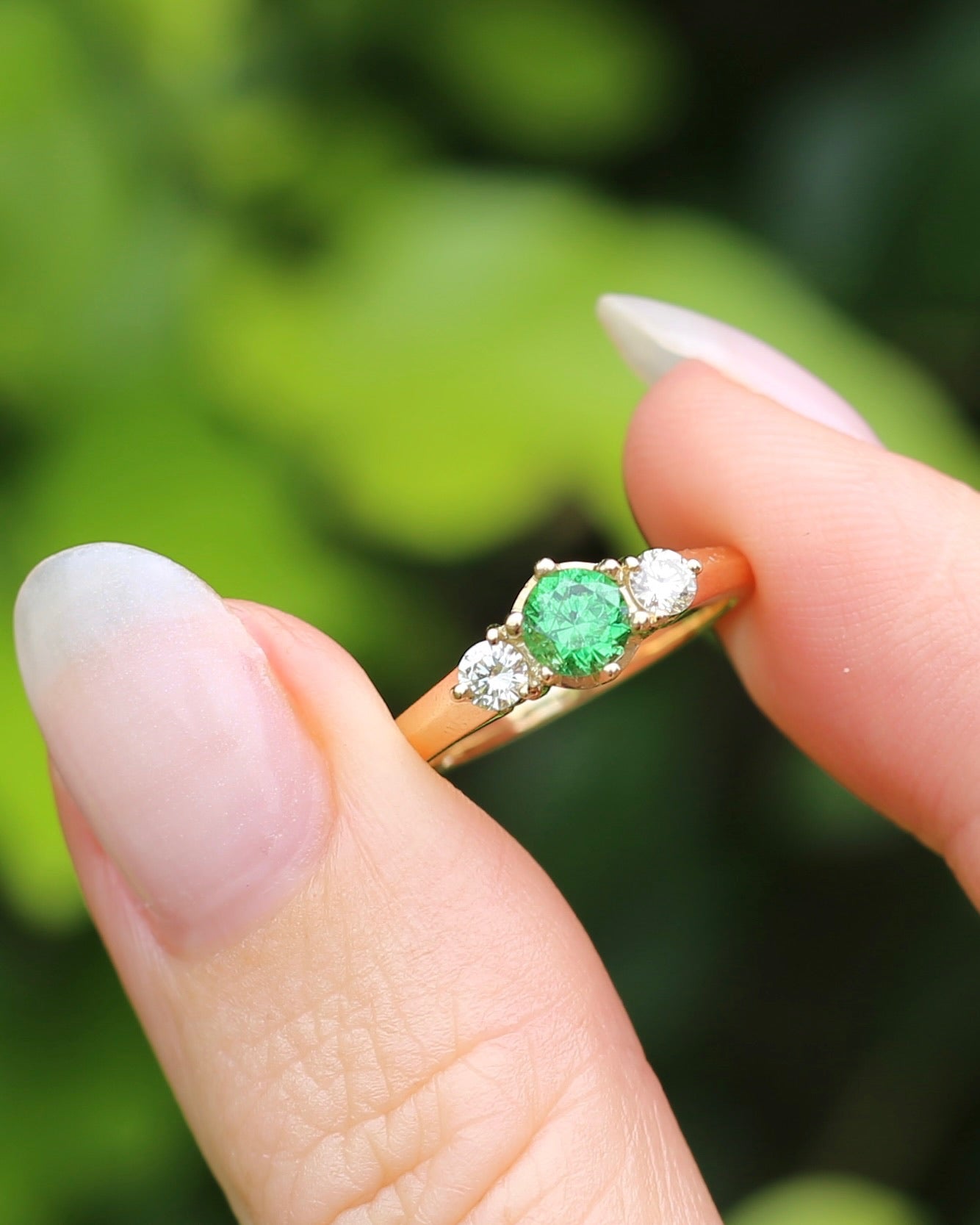 East African Tsavorite Garnet and Diamond Trilogy Ring, 18ct Yellow Gold, size K or 5.5 with valuation