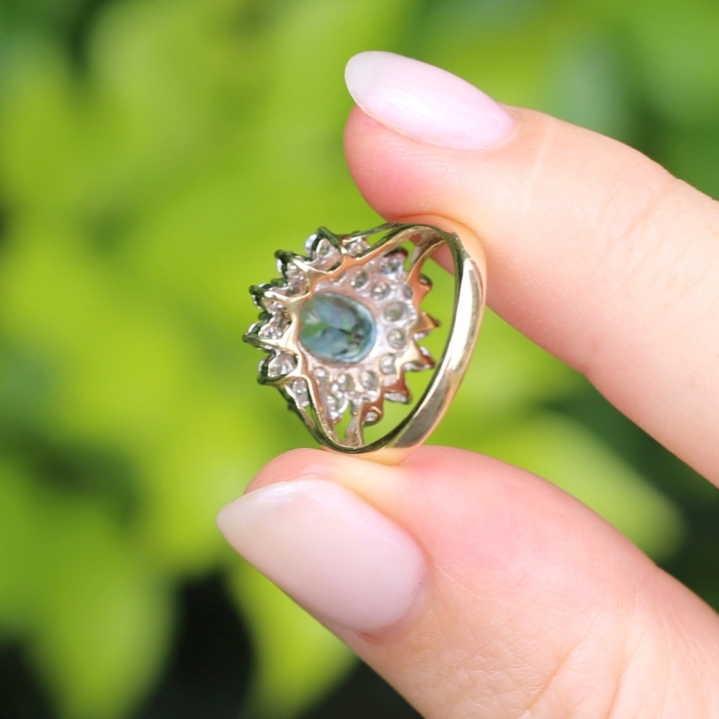 1.1ct Oval Aquamarine and Double Diamond Halo (0.88ct), 9ct White and Yellow Gold, size 6.25 or M