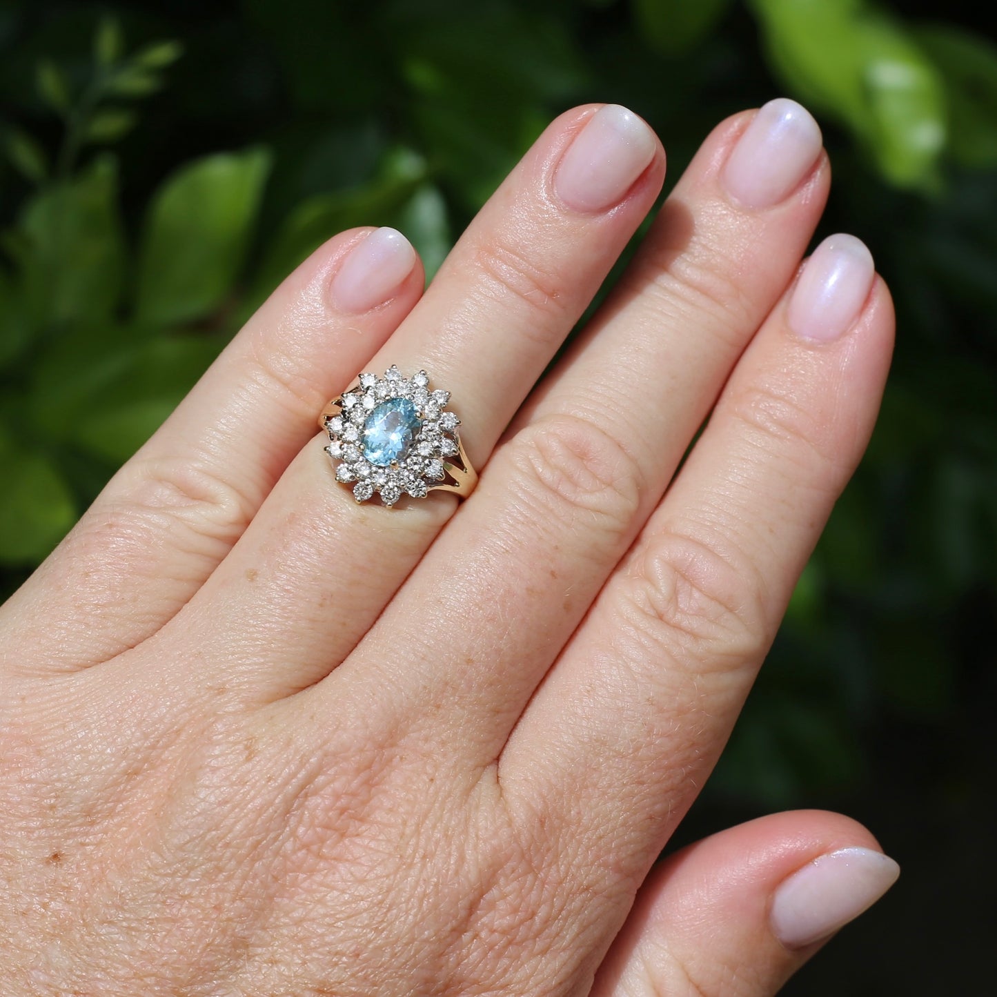 1.1ct Oval Aquamarine and Double Diamond Halo (0.88ct), 9ct White and Yellow Gold, size 6.25 or M