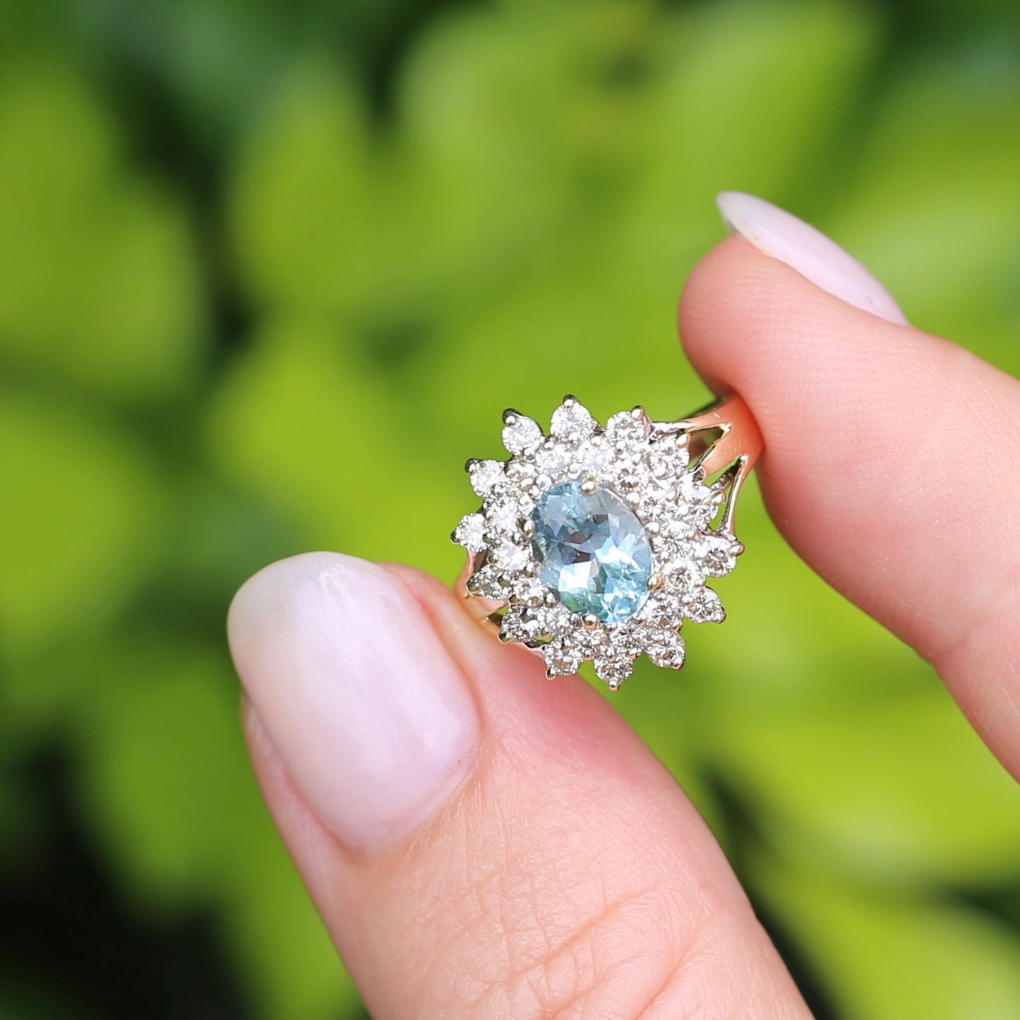 1.1ct Oval Aquamarine and Double Diamond Halo (0.88ct), 9ct White and Yellow Gold, size 6.25 or M