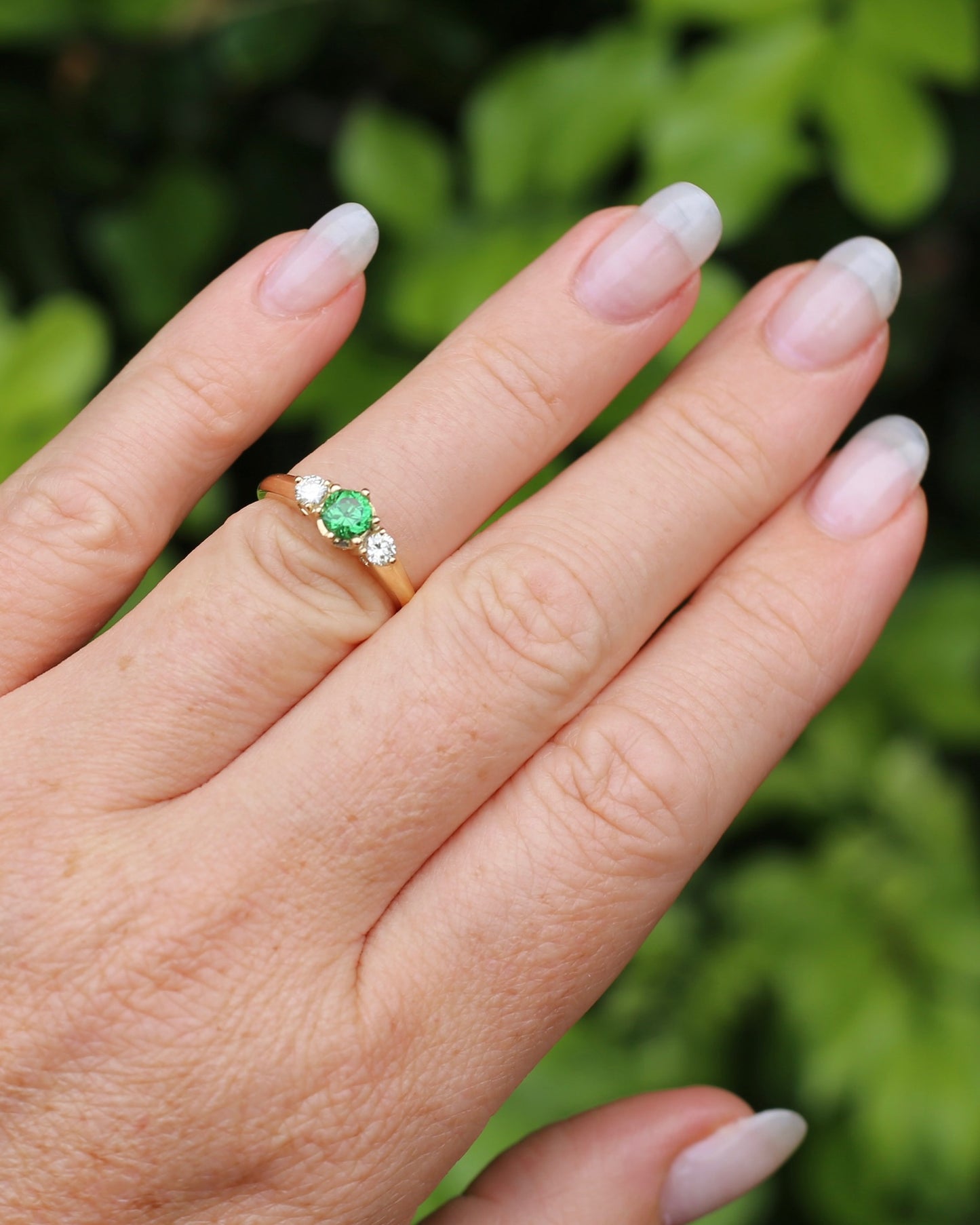 East African Tsavorite Garnet and Diamond Trilogy Ring, 18ct Yellow Gold, size K or 5.5 with valuation