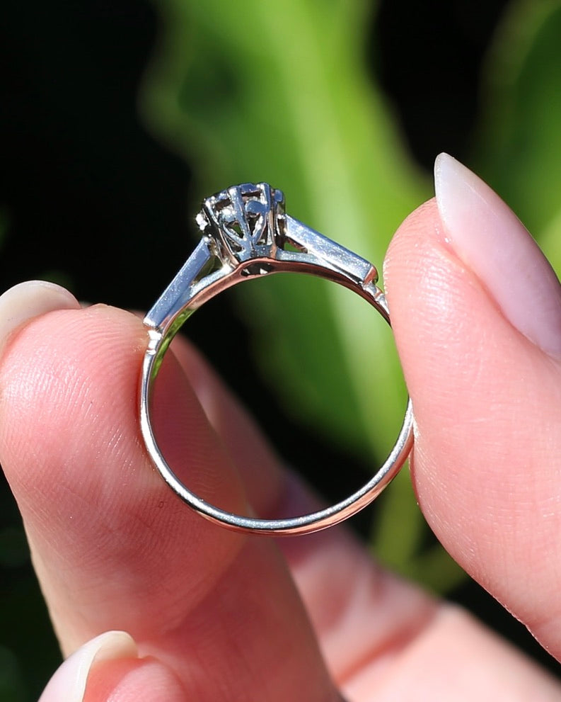 0.22ct old cut diamond solitaire, Platinum and Pale 18ct Gold, size P1/2