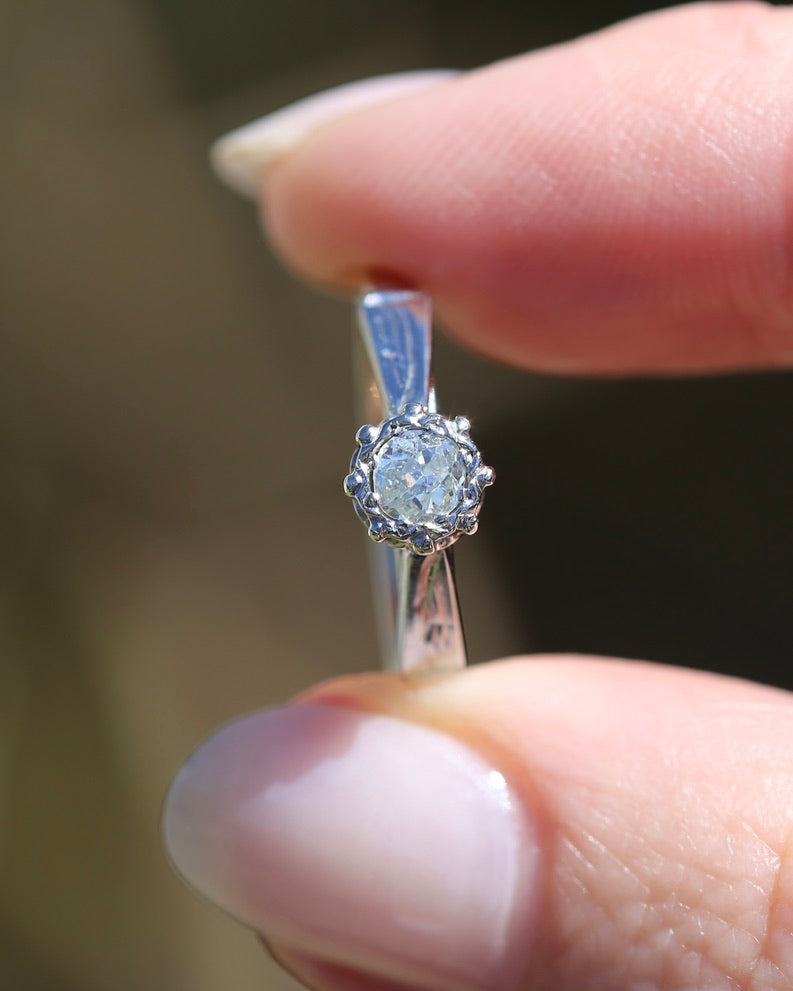 0.22ct old cut diamond solitaire, Platinum and Pale 18ct Gold, size P1/2