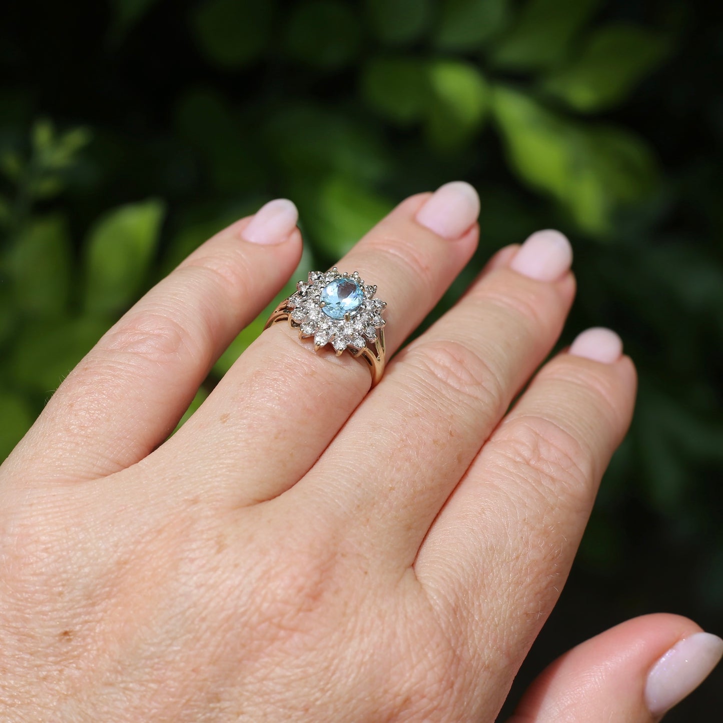 1.1ct Oval Aquamarine and Double Diamond Halo (0.88ct), 9ct White and Yellow Gold, size 6.25 or M