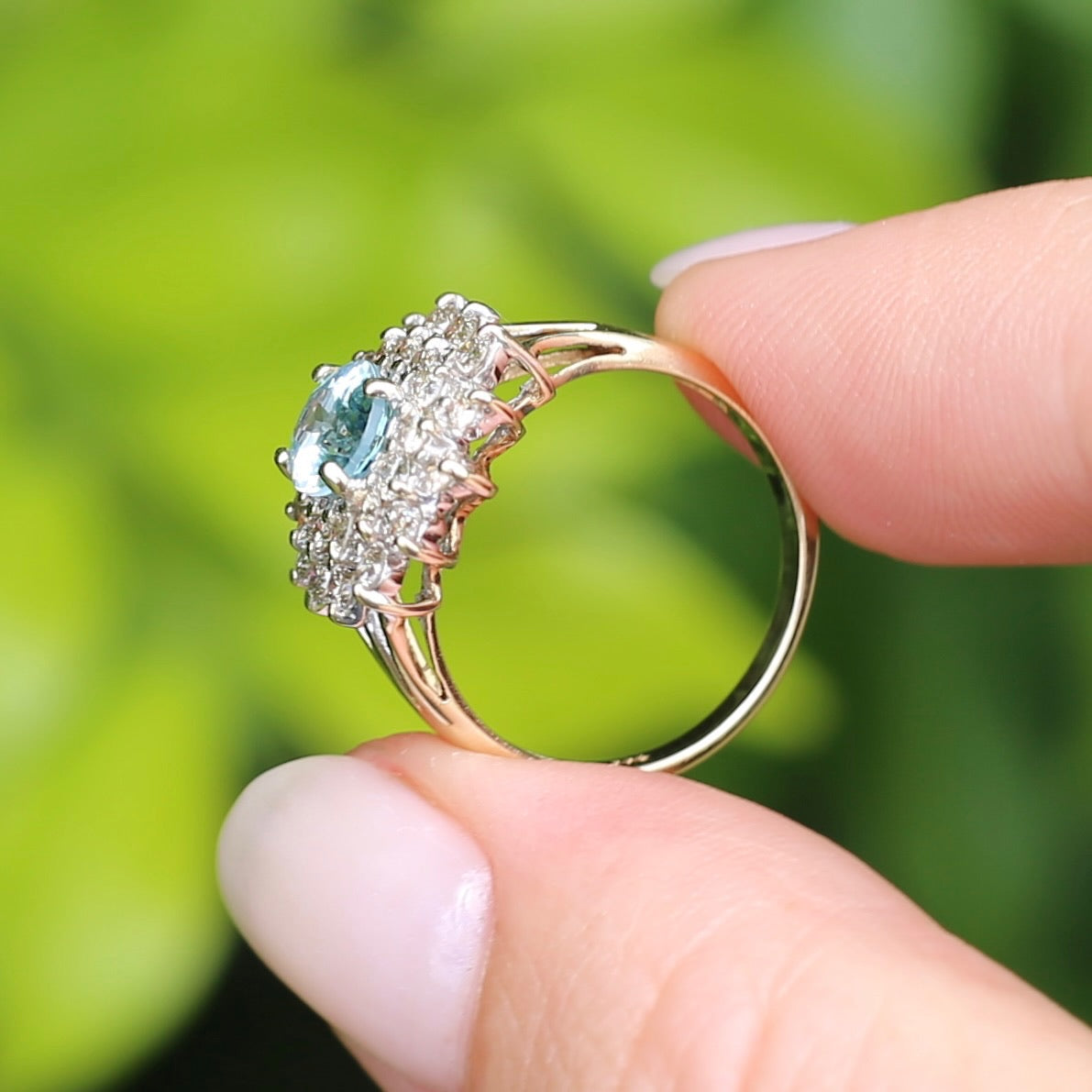 1.1ct Oval Aquamarine and Double Diamond Halo (0.88ct), 9ct White and Yellow Gold, size 6.25 or M