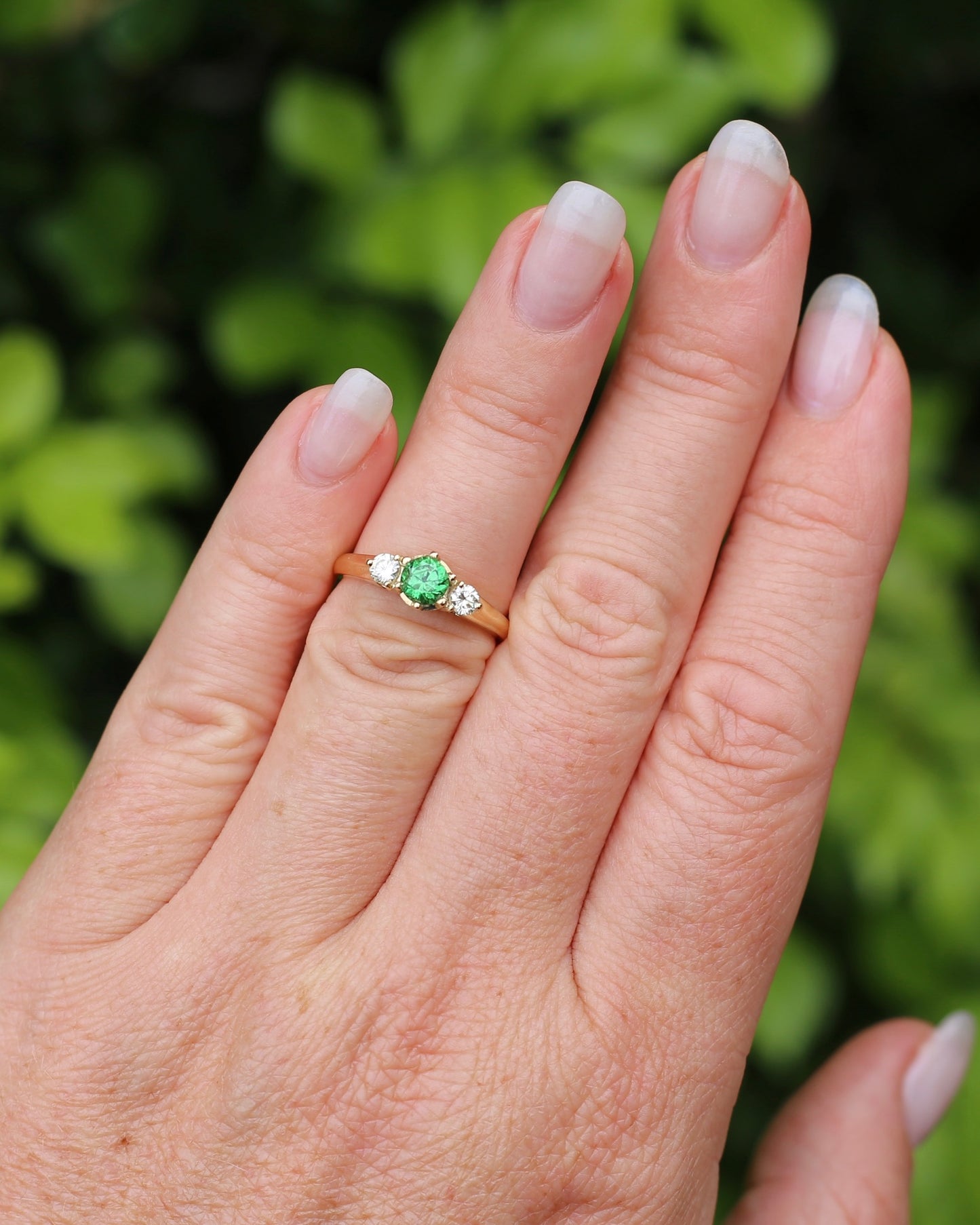 East African Tsavorite Garnet and Diamond Trilogy Ring, 18ct Yellow Gold, size K or 5.5 with valuation