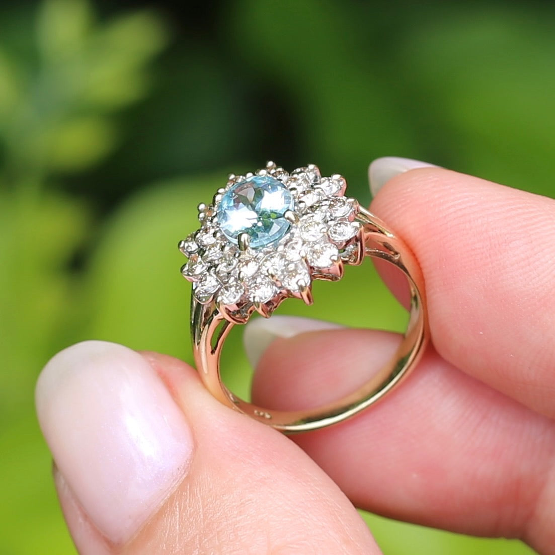 1.1ct Oval Aquamarine and Double Diamond Halo (0.88ct), 9ct White and Yellow Gold, size 6.25 or M