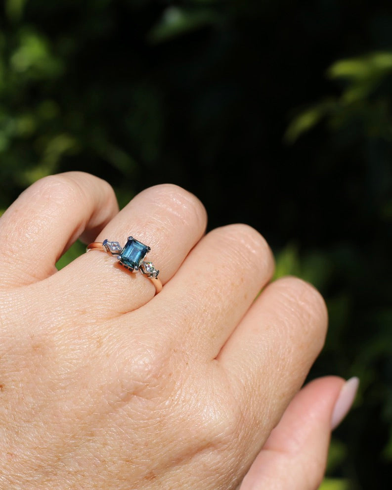 1.09ct Emerald Cut Teal Australian Sapphire With Diamonds in Vintage Trilogy Setting, 9ct Yellow and White Gold, size N1/2 or 6.75, 2.05g