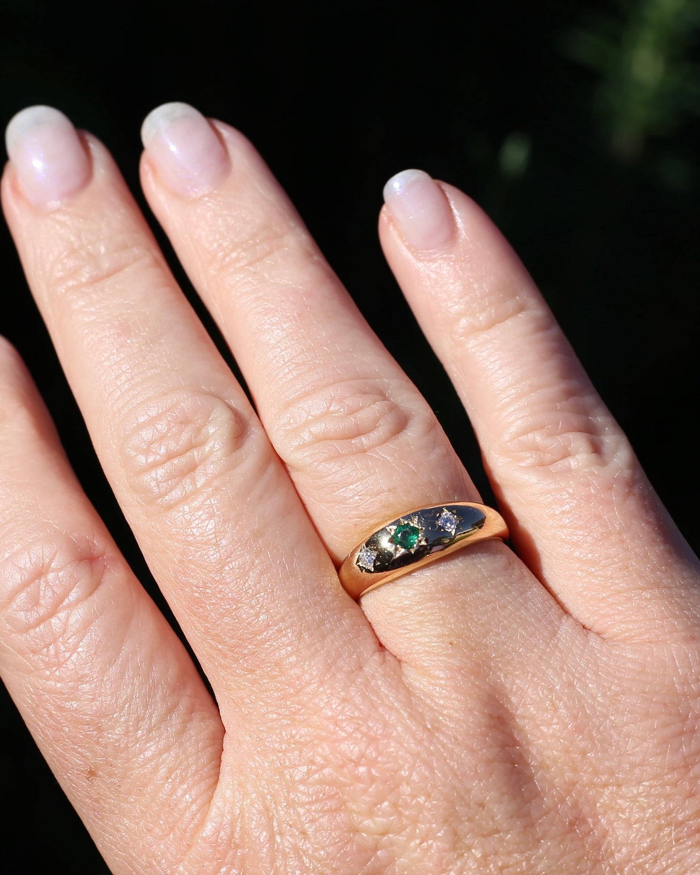 1975 Made Natural Emerald and Diamond Star Set Trilogy, 18ct Yellow Gold, size 7.75 or just under P1/4