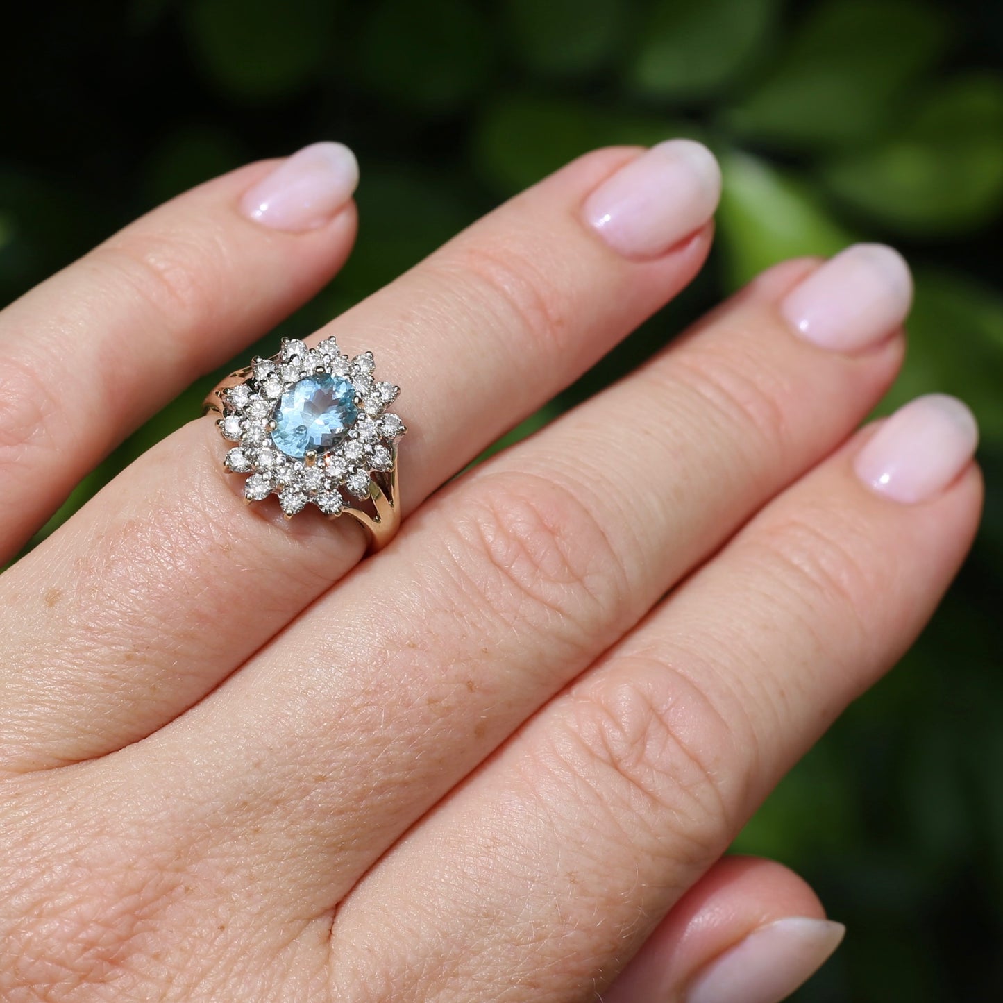 1.1ct Oval Aquamarine and Double Diamond Halo (0.88ct), 9ct White and Yellow Gold, size 6.25 or M