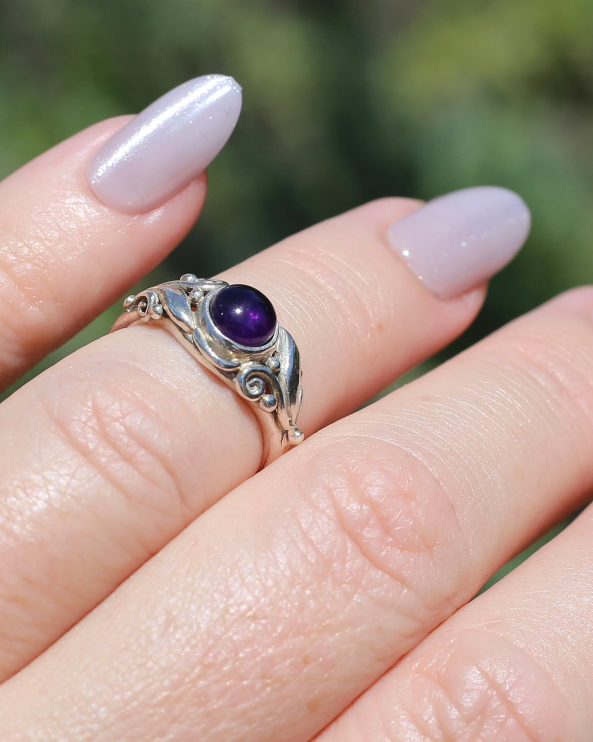 Amethyst Cabochon in Bezel Setting and Leaf & Swirl Surrounds, Sterling Silver, size J1/2 or 5, 3.38g