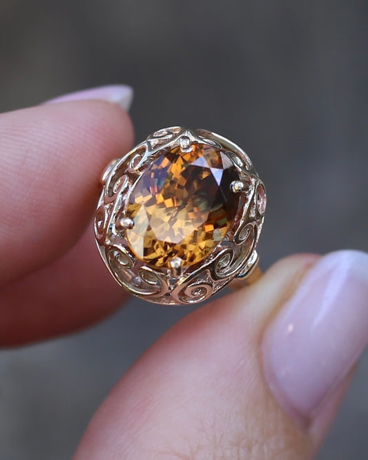 6.9ct Oval Natural Zircon in Raised Filigree Setting, 10ct Yellow Gold, size M1/2 or 6.5, 4.83g