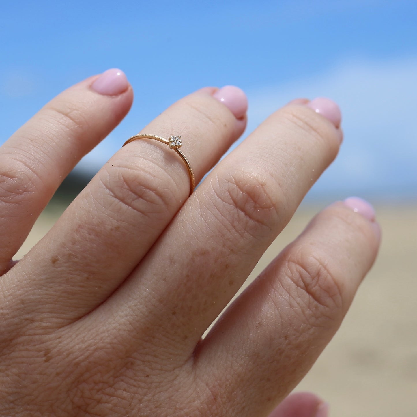 Dainty Textured Band with Four Round Brilliant Diamonds in a Diamond Shape, size M or just under 6.25