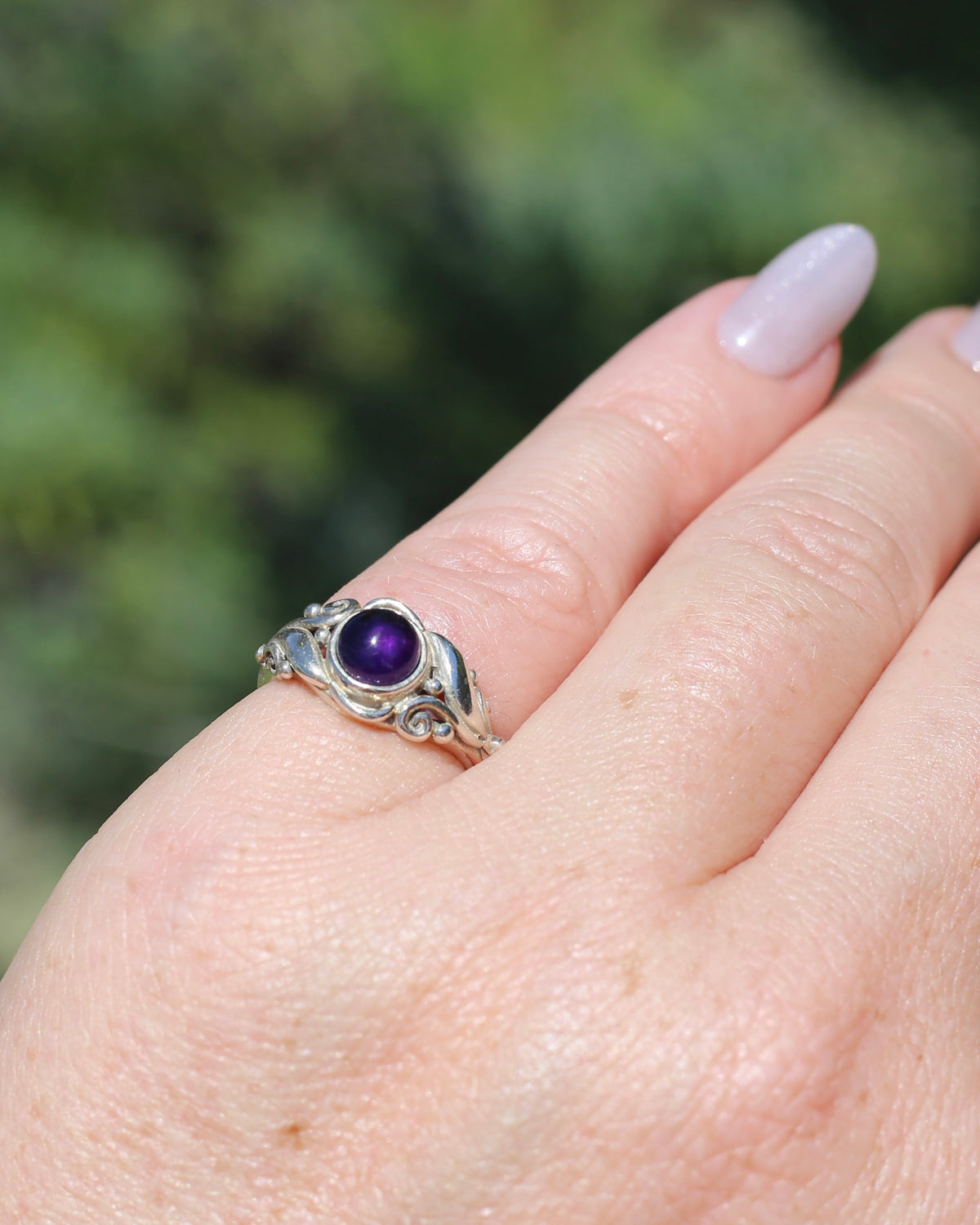 Amethyst Cabochon in Bezel Setting and Leaf & Swirl Surrounds, Sterling Silver, size J1/2 or 5, 3.38g
