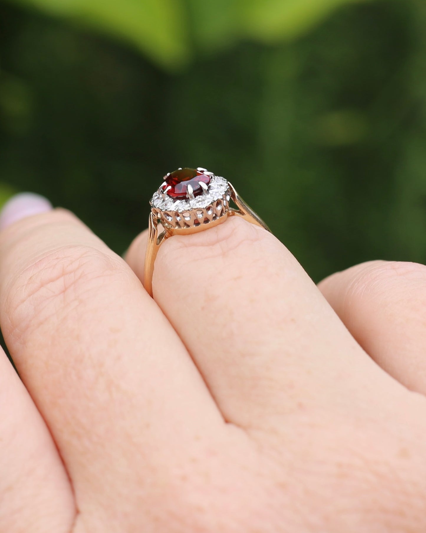 1974 Made Garnet and Diamond Halo Ring, 9ct Yellow and White Gold, size M1/2 or 6.5, 2.83g