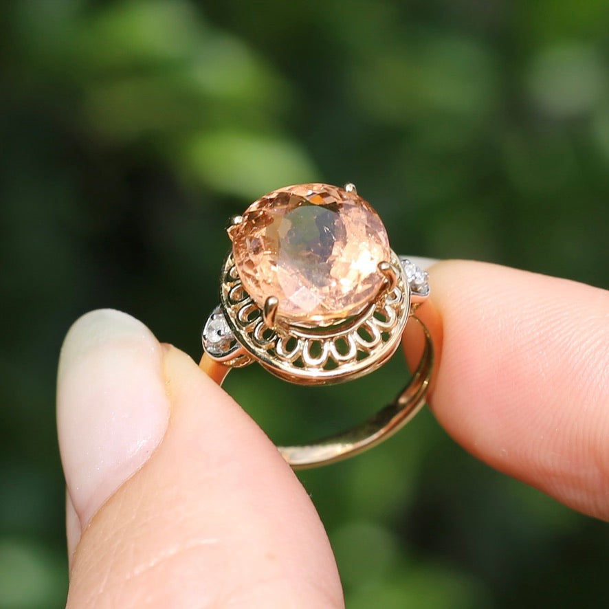 Oval Peach Tourmaline Ring with Pierced Wire Surrounds and Diamonds in the Shoulders, 9ct Yellow Gold, size N or 6.75