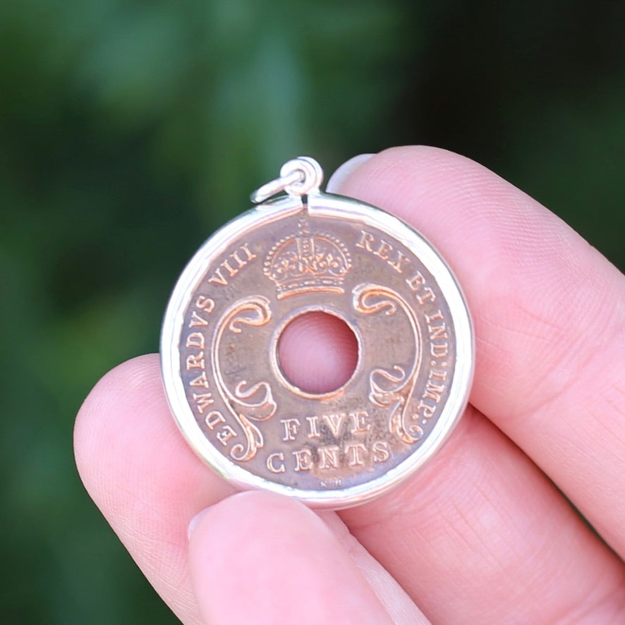 Global Coins in Silver Bezel Frames