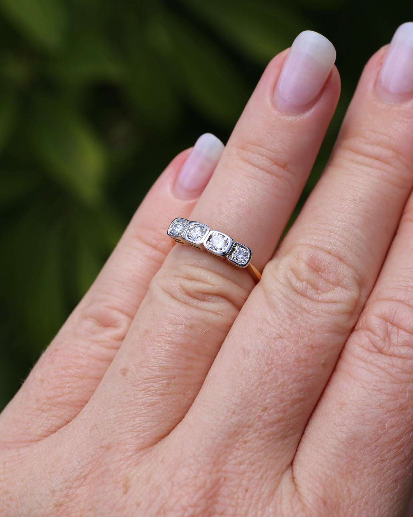 Circa 1930s Four Stone "Quadrillo" Diamond Ring, 18ct Yellow Gold and Paladium, size just over K1/2 or just over 5.5, 3.04g, with valuation