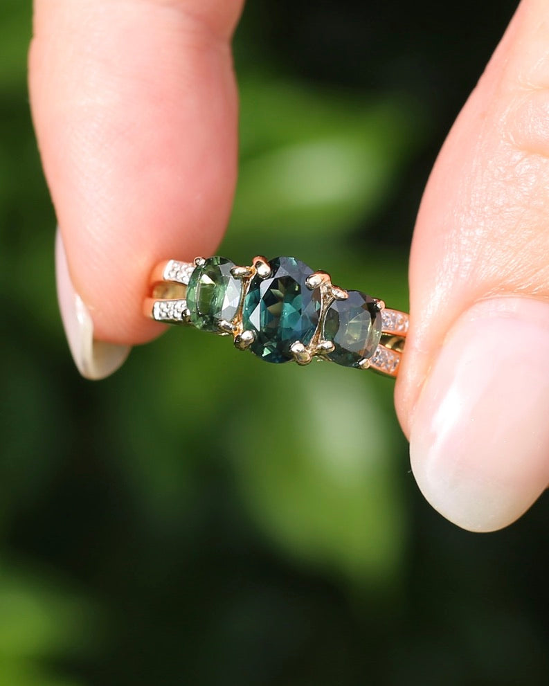 2.49ct Australian Green and Parti Sapphire Trilogy with diamond side stones, 10ct Yellow Gold, size 7 or just over N1/2, 3.38g