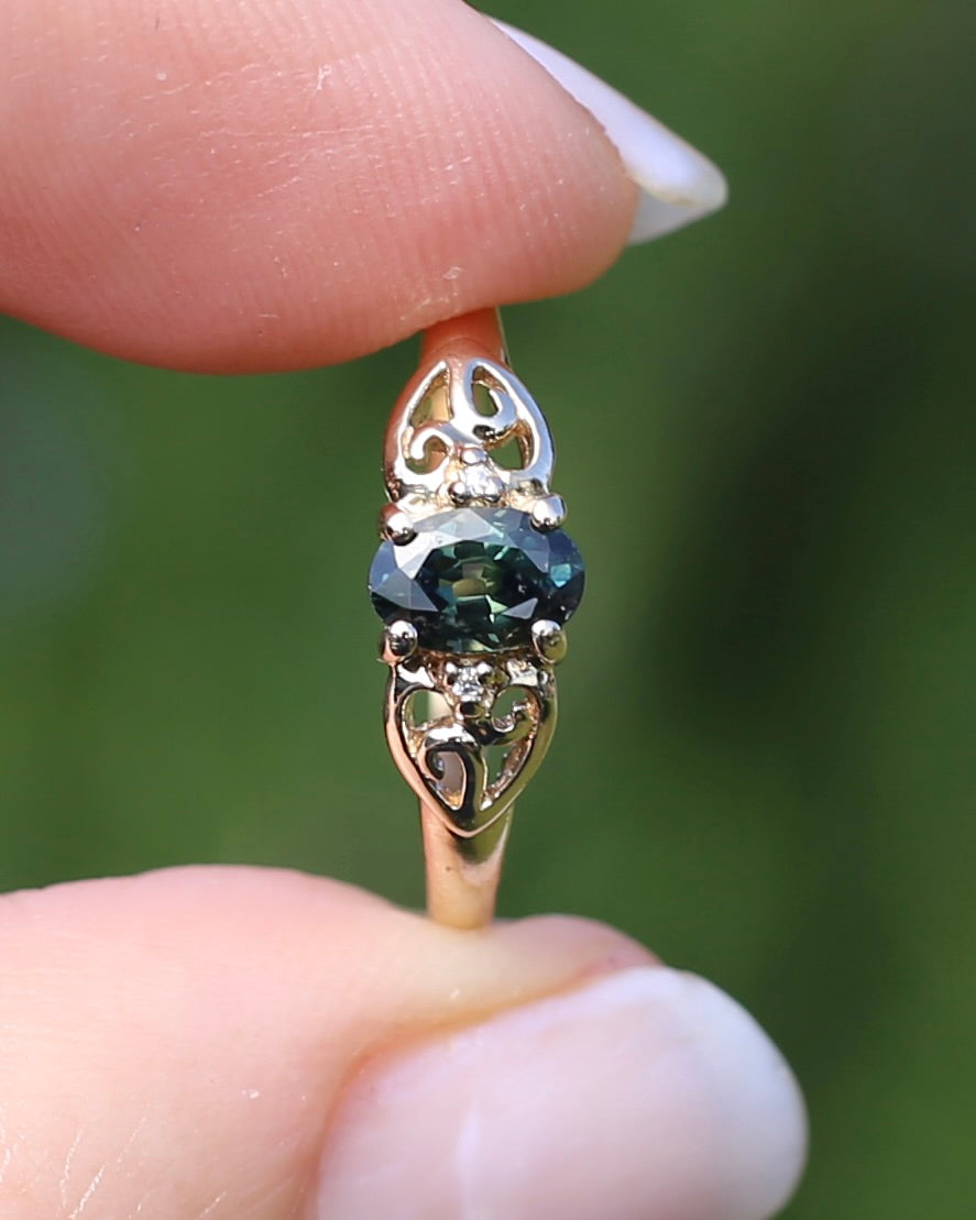 0.75ct Natural Teal Green Parti Sapphire with tiny Diamond Set Swirl Shoulders, 9ct Yellow Gold, size M1/2  or  just under 6.5, 1.44g