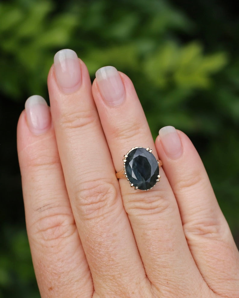 8.4ct Opaque Blue Sapphire, in Four Double Claw Filigree 9ct Yellow Gold Ring, size J or 4.75, 3.53g