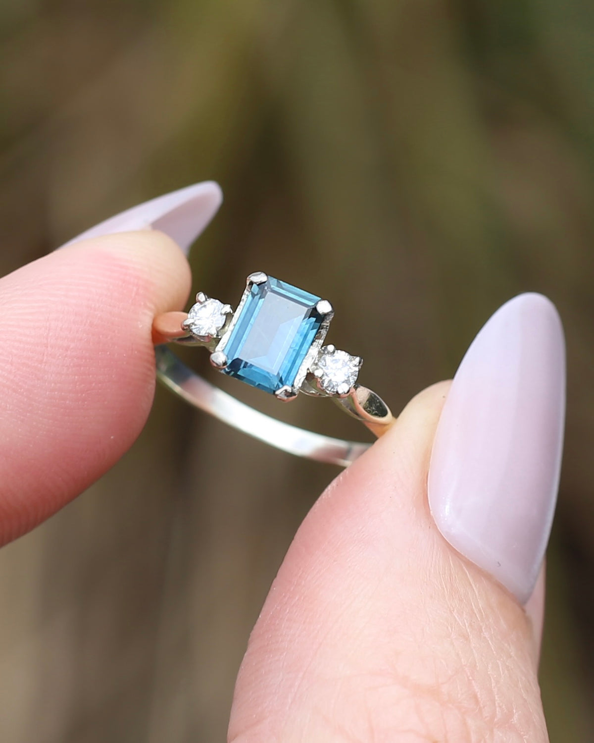 1.1ct Emerald Cut Natural Blue Teal Sapphire and Diamond Trilogy, 18ct White Gold and Platinum, size O or just over 7, 2.27g