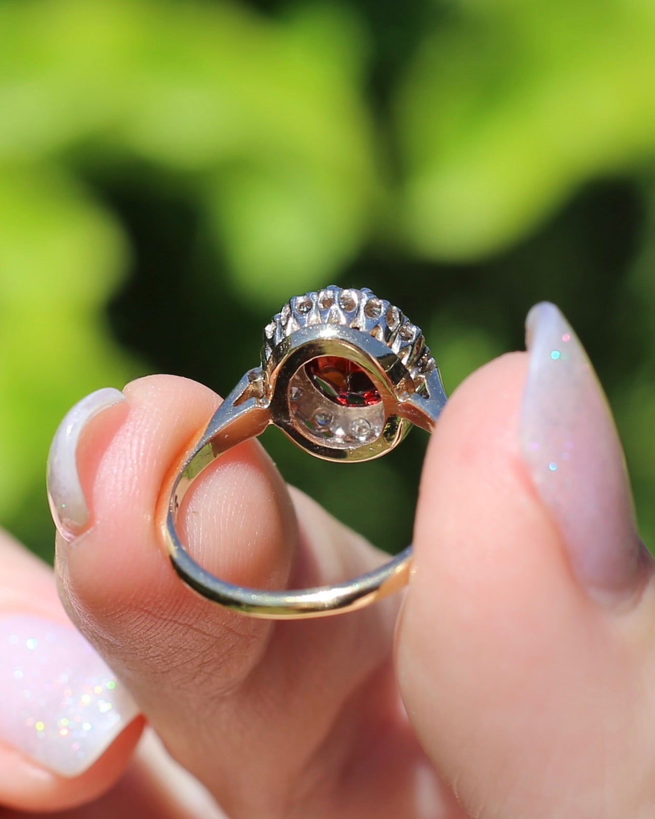 1974 Made Garnet and Diamond Halo Ring, 9ct Yellow and White Gold, size M1/2 or 6.5, 2.83g
