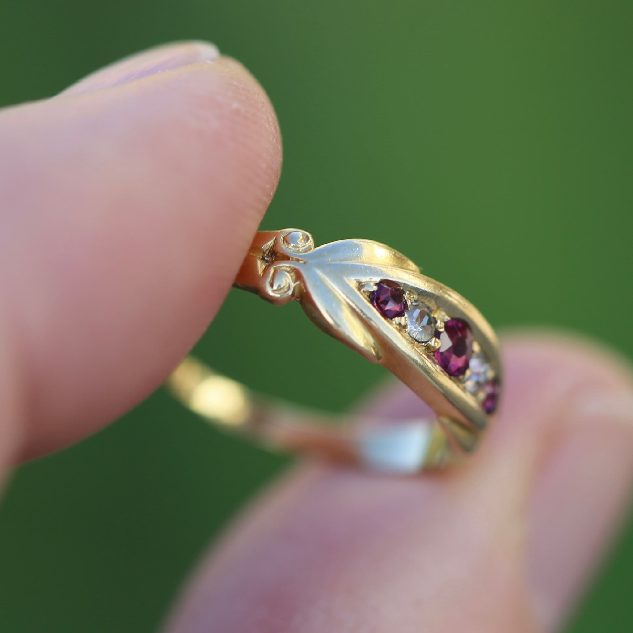 Gold ruby diamond on sale ring