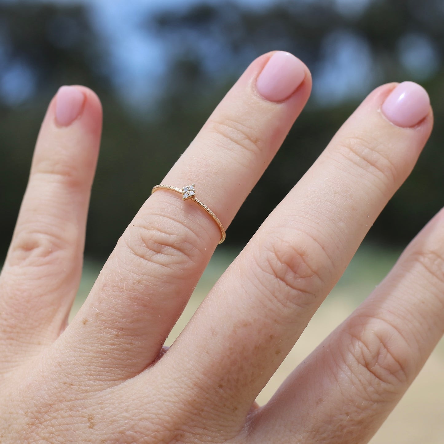 Dainty Textured Band with Four Round Brilliant Diamonds in a Diamond Shape, size M or just under 6.25