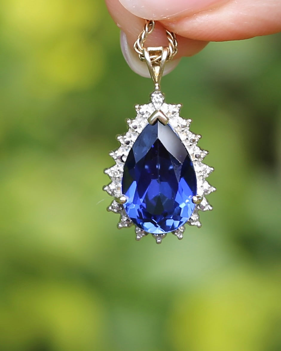 5ct Lab Grown Sapphire and Illusion Set Pendant with 2 Diamonds, 9ct Yellow Gold (some Rhoidum Plating), 2.47g