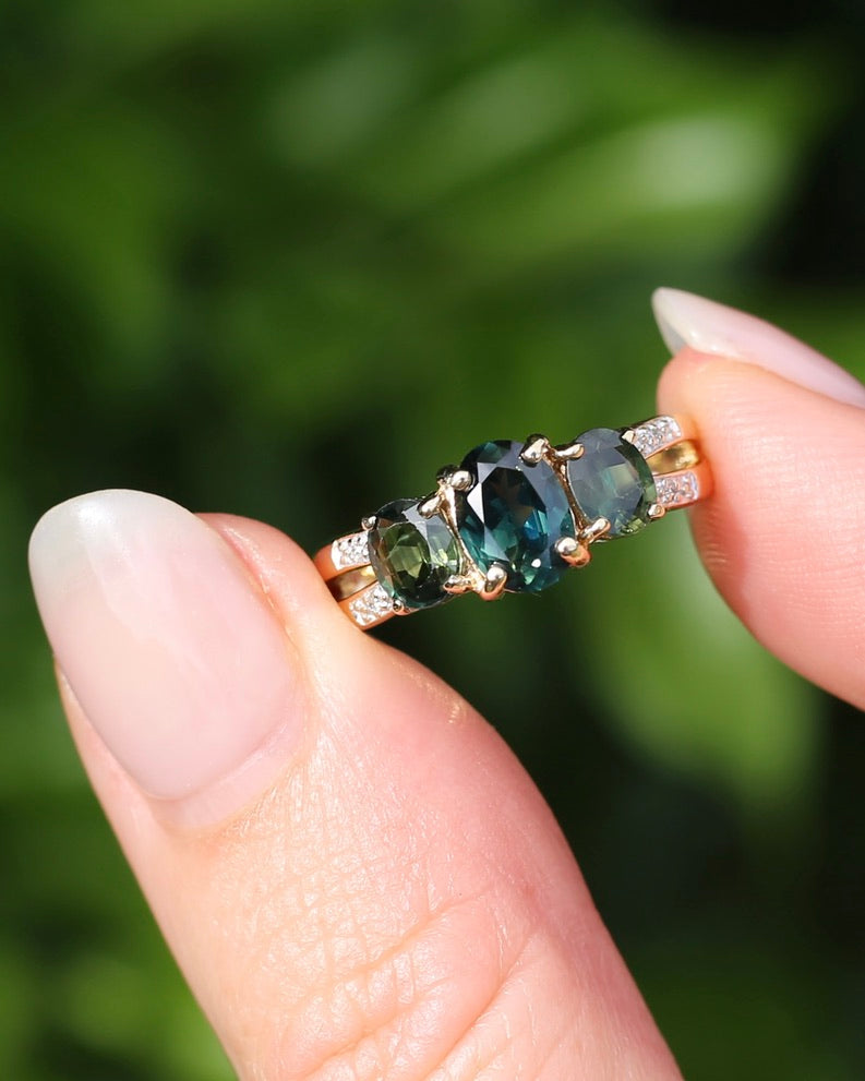2.49ct Australian Green and Parti Sapphire Trilogy with diamond side stones, 10ct Yellow Gold, size 7 or just over N1/2, 3.38g
