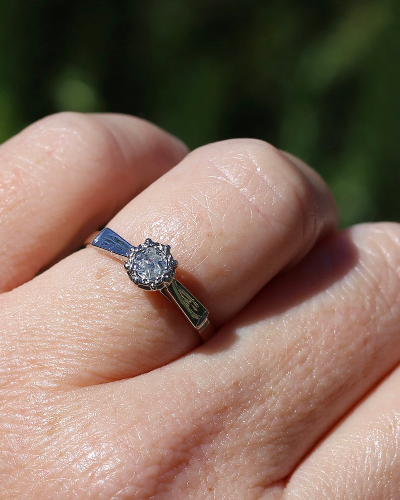 0.22ct old cut diamond solitaire, Platinum and Pale 18ct Gold, size P1/2